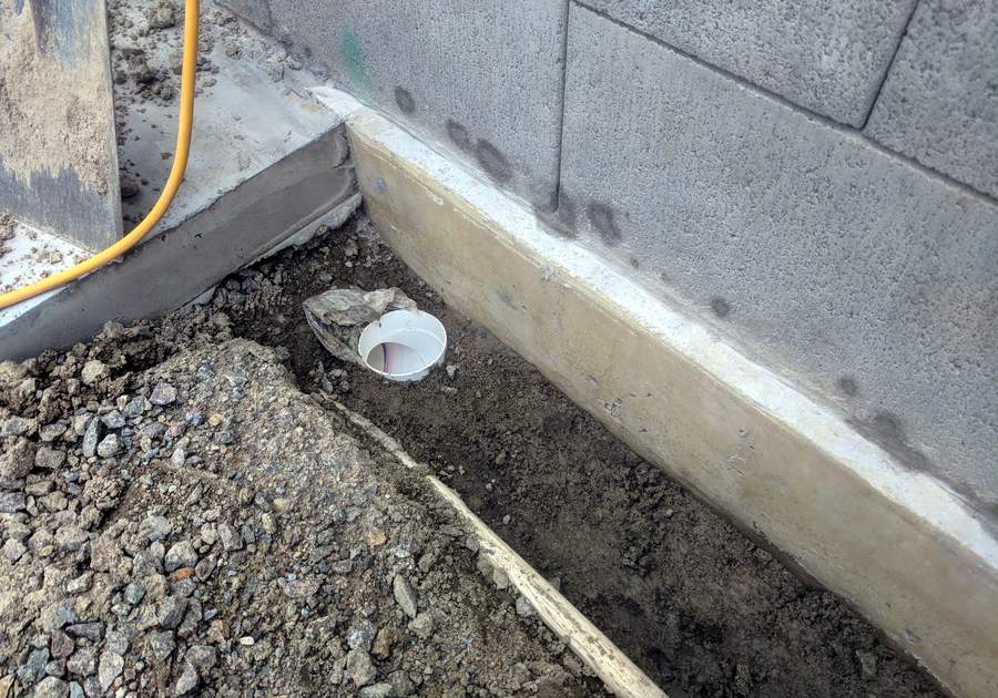 Outlet for trench drain