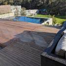 Integrating the pool and house with a wooden deck